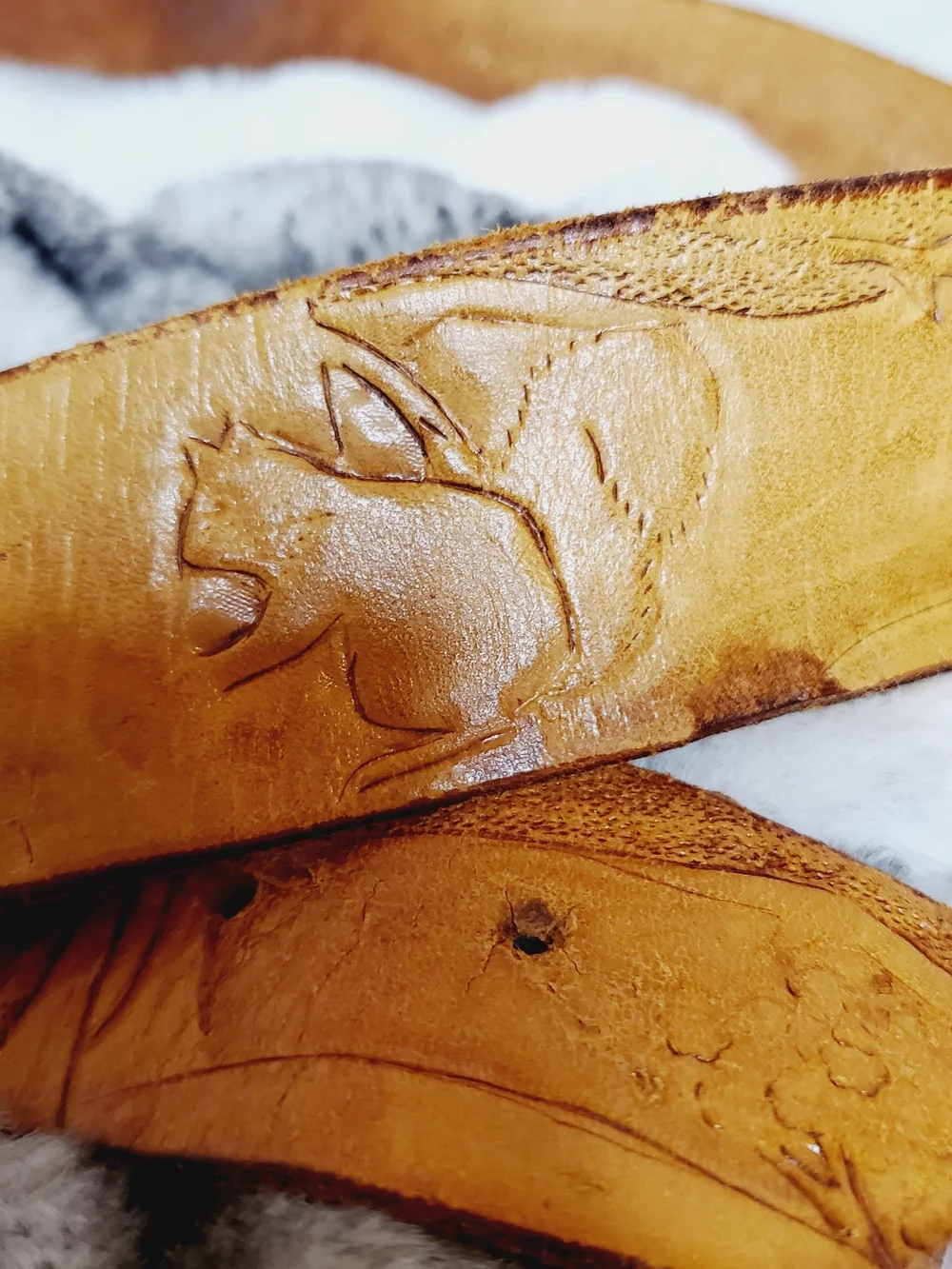 Vintage hand-tooled leather belt features a distinctive Viking Valknut symbo